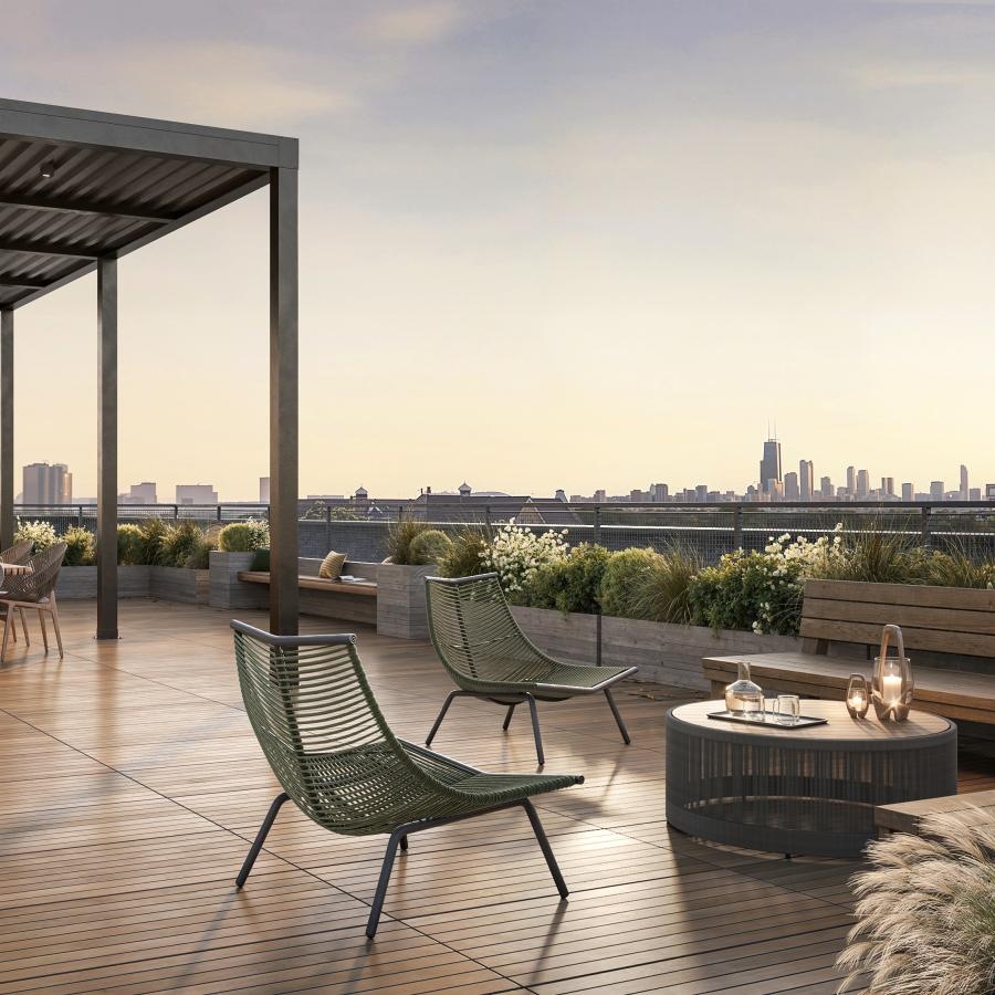 Find your perfect fit at Five Points a deck with chairs and tables on it with a city in the background